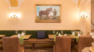 Hotel Bockmaier Oberpframmern bei München Bistro Tische